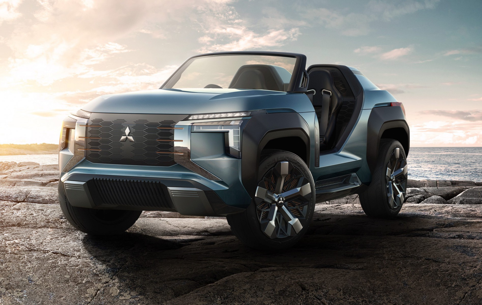Mitsubishis Mi-Tech dune buggy has four electric motors and a jet fighter windscreen