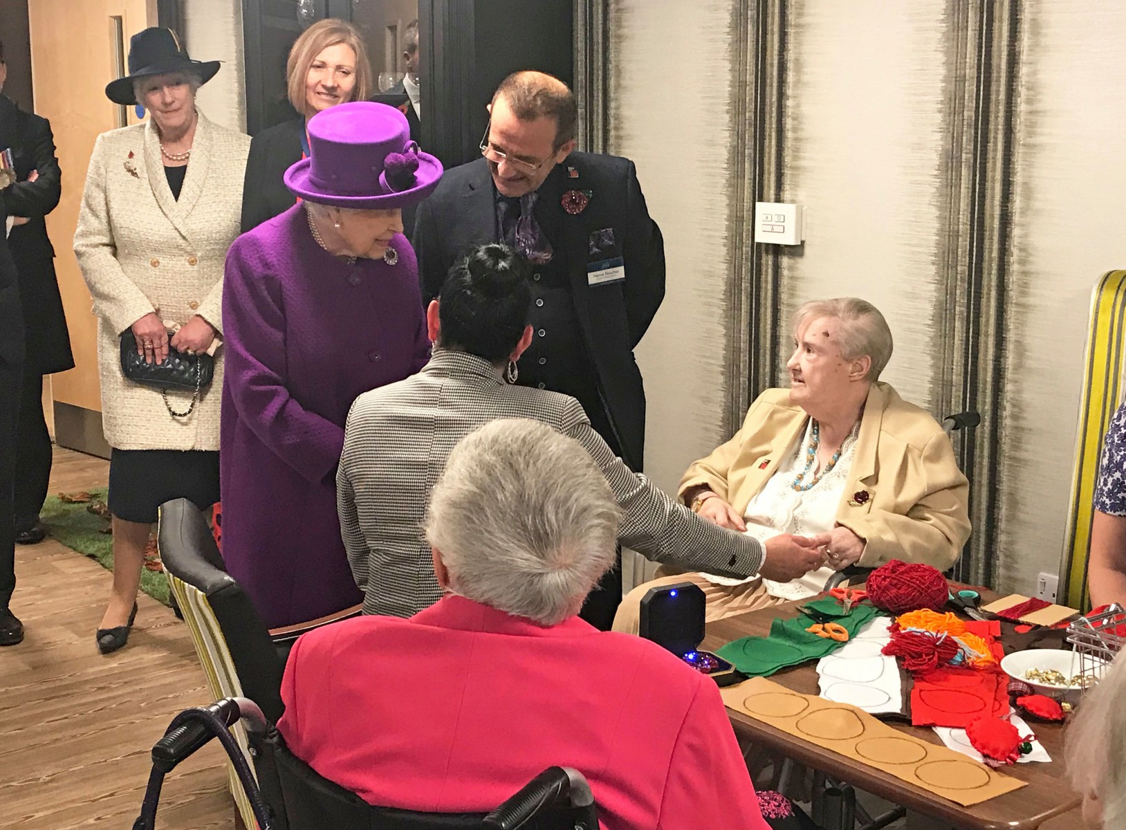 The monarch speaks with OAPs and learns about the recreational activities on offer at the village