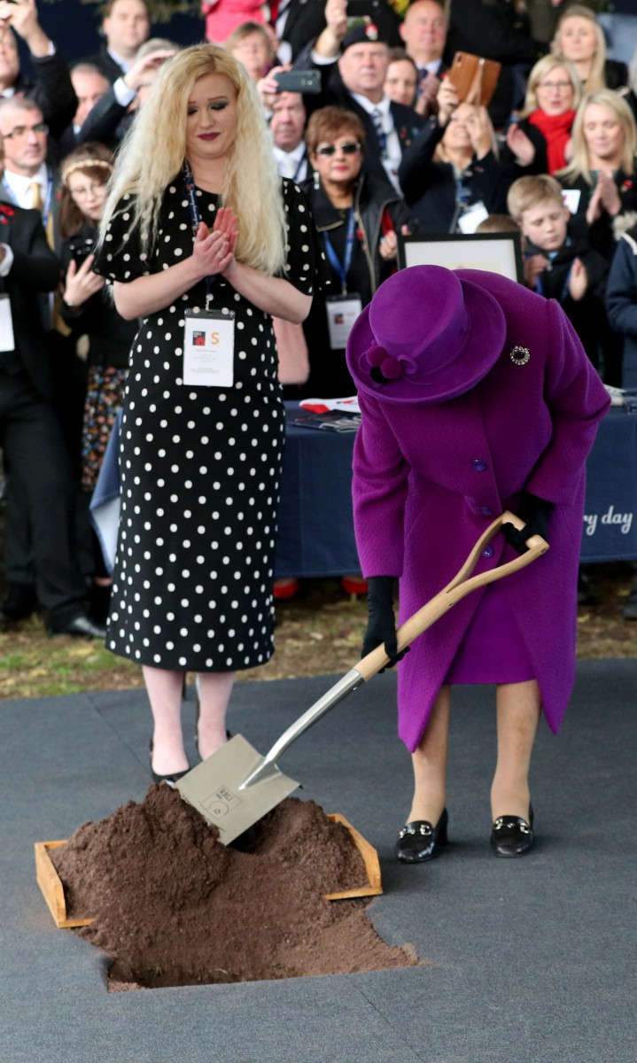The Queen buried a time capsule at the Centenary Village and it will be opened in 100 years by future residents