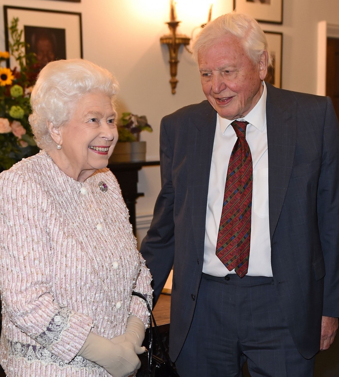 The monarch was straight back to work tonight as she presented Sir David Attenborough with a prize for his work in highlighting plastic pollution