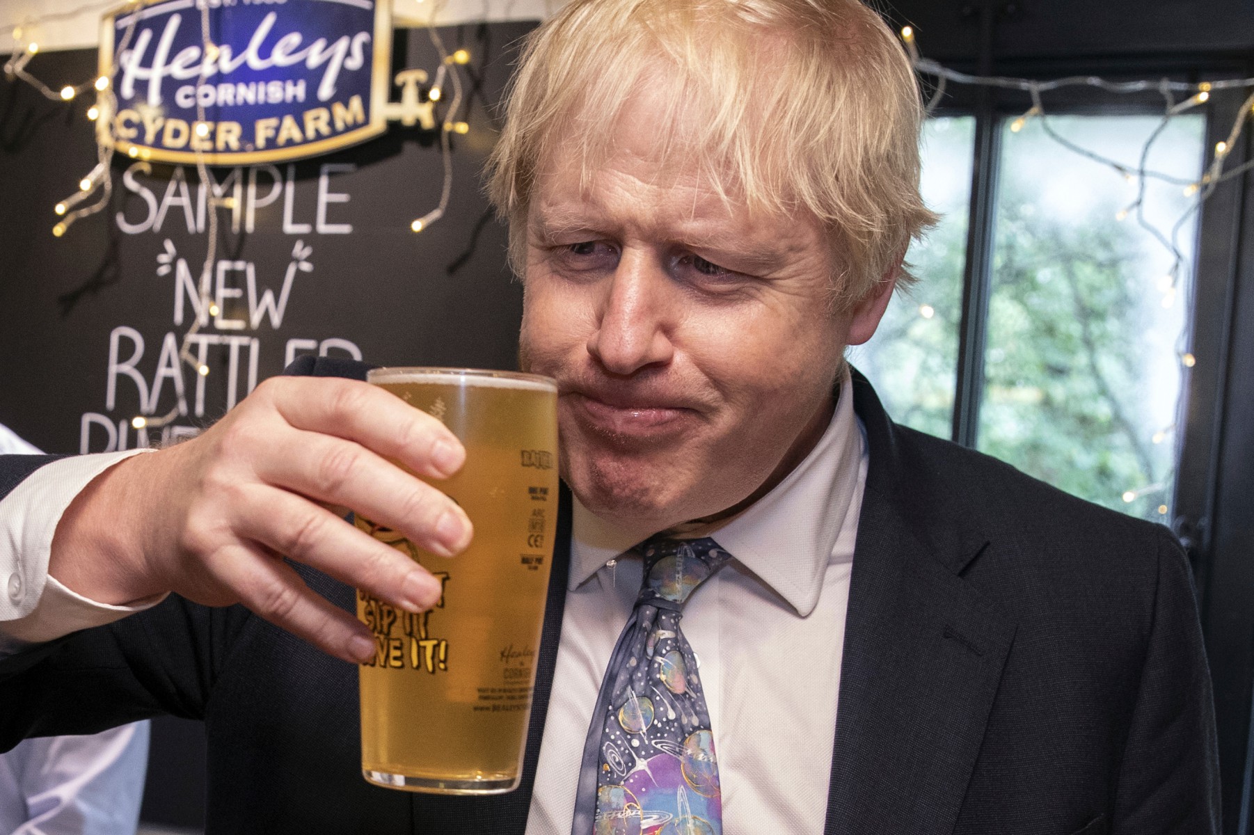 <a href='https://en.wikipedia.org/wiki/Boris_Johnson'></img>Boris Johnson</a> samples a pint of cider in Cornwall after pledging to pour billions of pounds into the NHS, schools and the police” width=”960″ height=”639″ /><figcaption class=