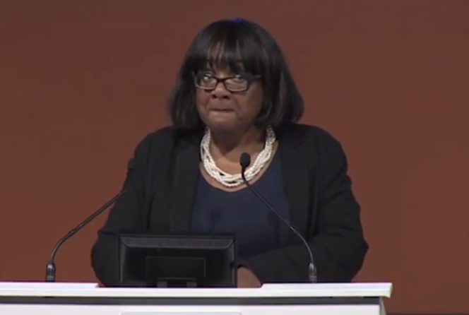 Diane Abbott pictured speaking at the Police Federation conference where she was heckled by officers