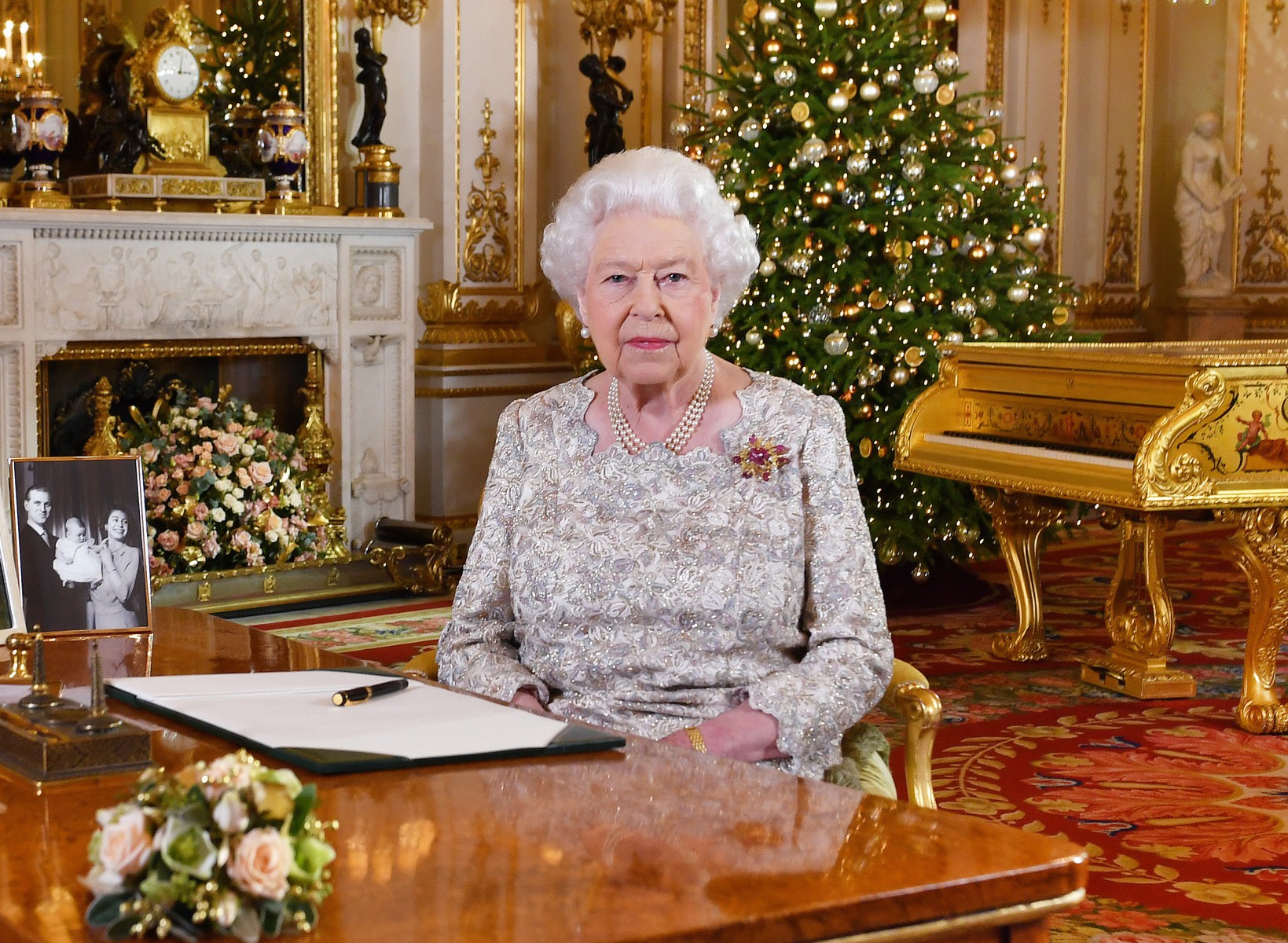 The Queen is said to give out 620 gifts to her staff and family, according to a former aide