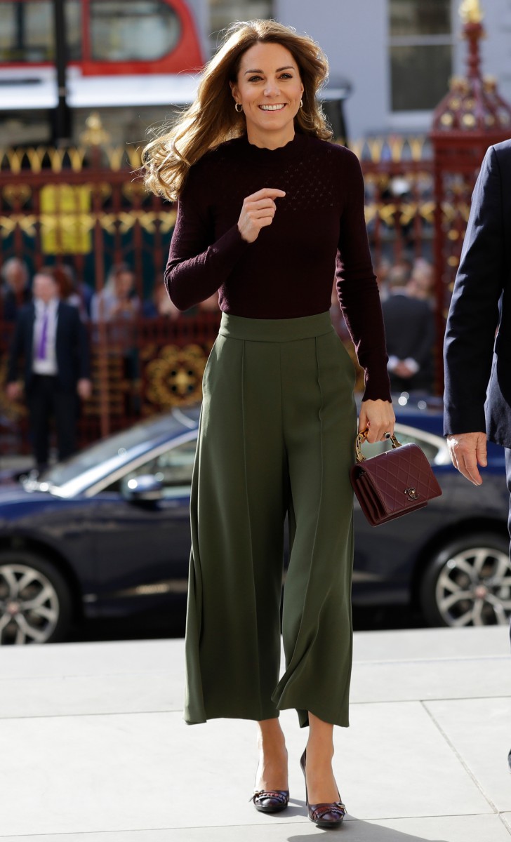 Kate wore a maroon scalloped neck jumper from Warehouse last month 