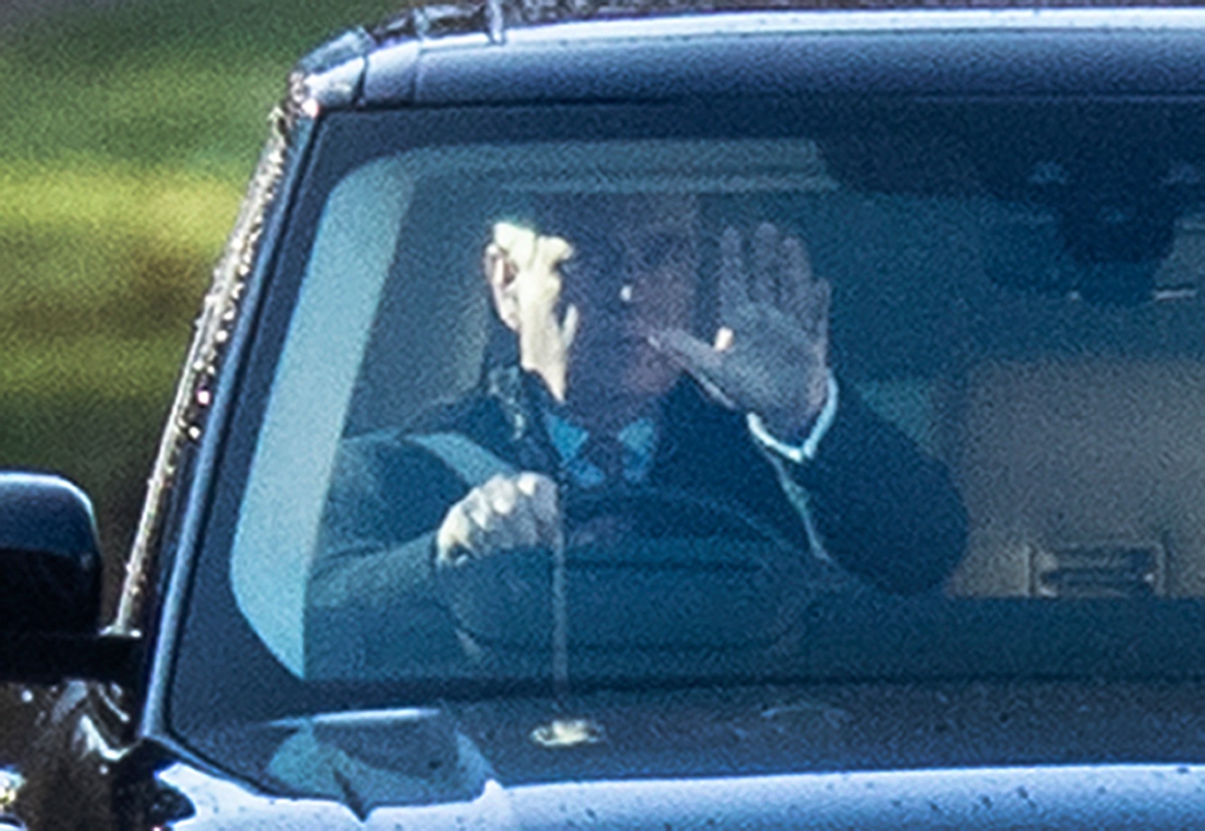 Andrew seen at the wheel of a Range Rover at Windsor Castle today