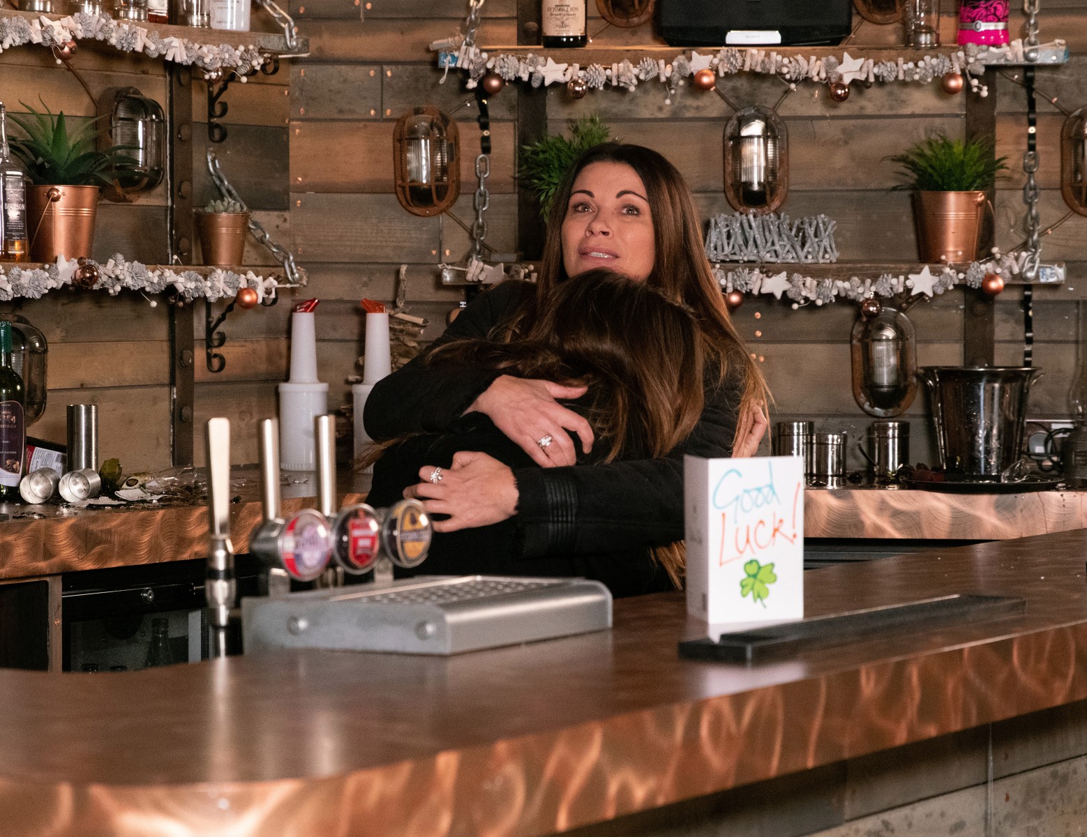 Carla comforts Michelle after finding her smashing the Bistro to smlithereens