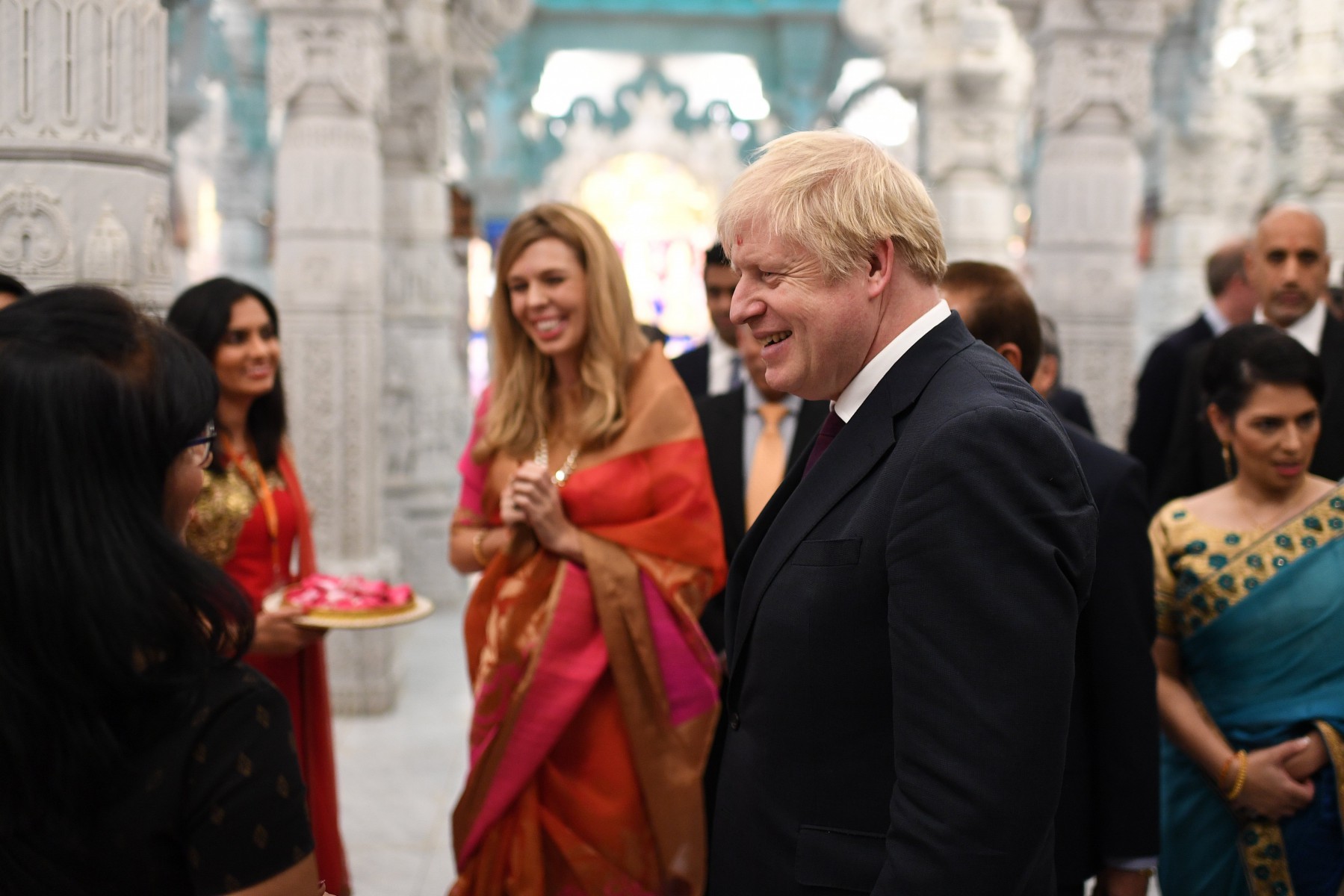 Britain's Prime Minister Boris Johnson and his partner Carrie Symonds visit Neasden Temple