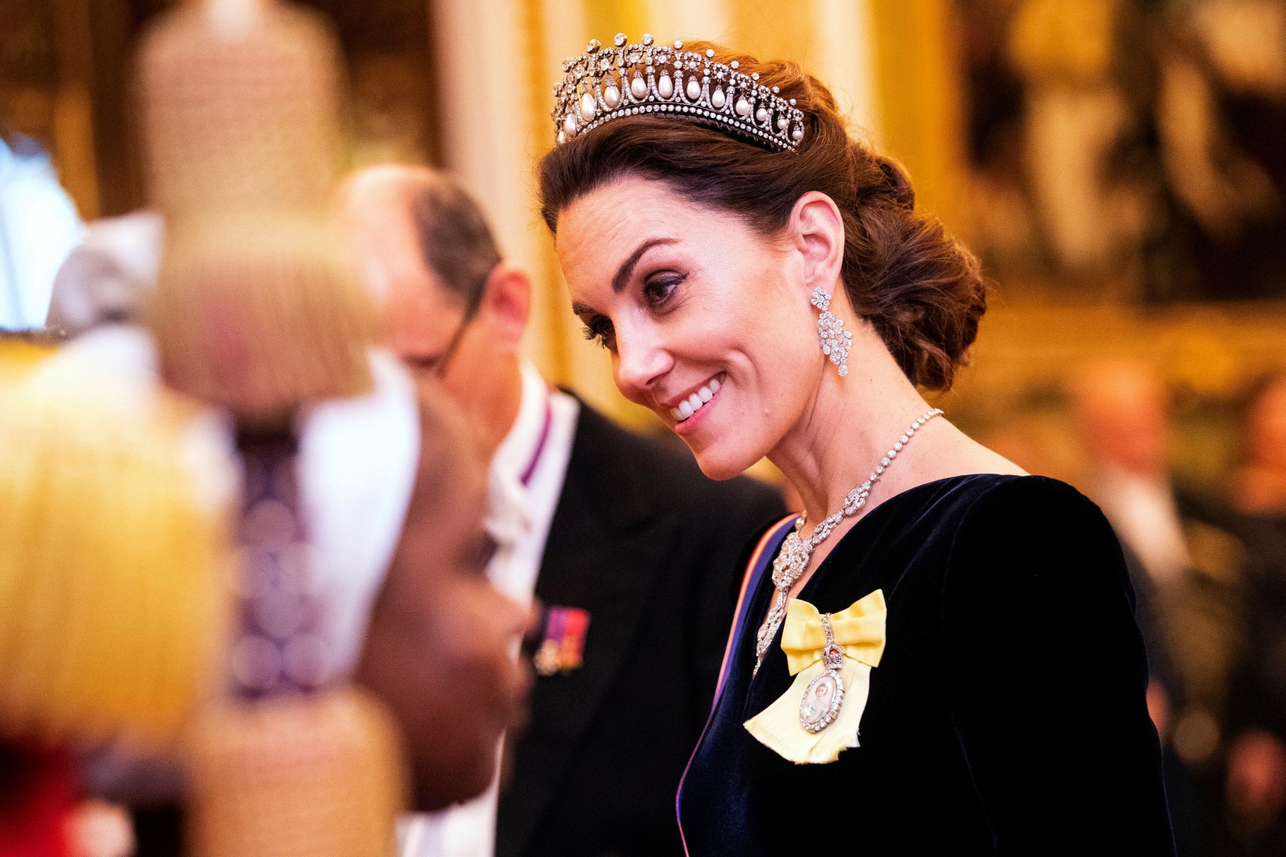Kate Middleton wore an eco-friendly brooch to a palace reception last night