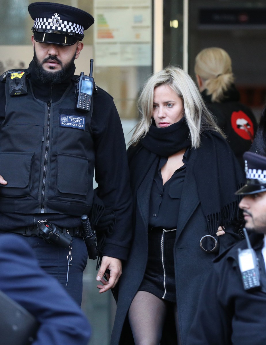 Flack leaves court today in North London surrounded by police