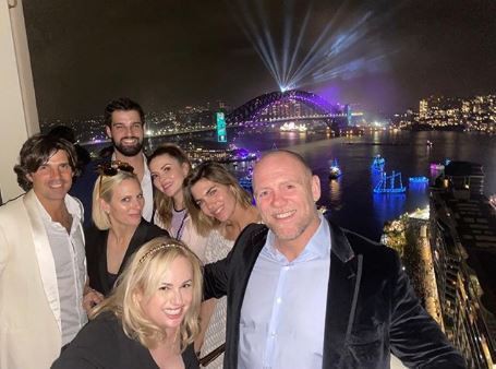 Rebel Wilson shared this New Year's Eve photo with Mike and Zara Tindall and fellow guests by Sydney Harbour Bridge