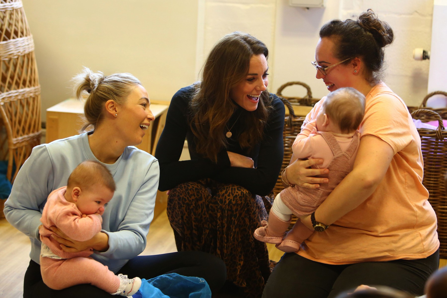 Kate Middleton was seen cooing over a little baby at the Ely & Caerau Children's Centre in Cardiff