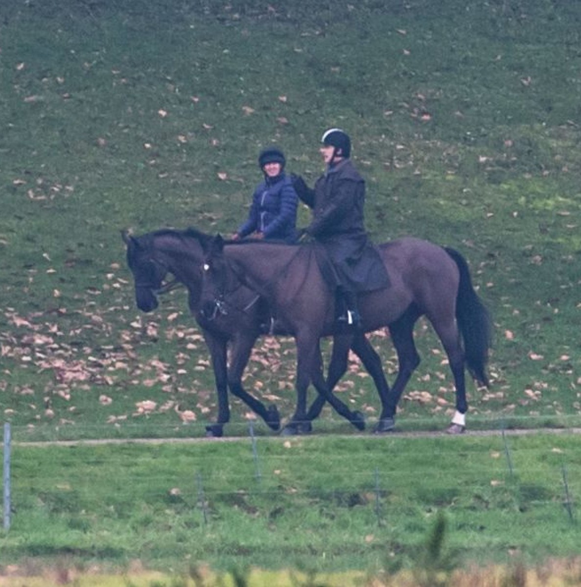 Prince Andrew riding out with a friend at Windsor Castle on Saturday