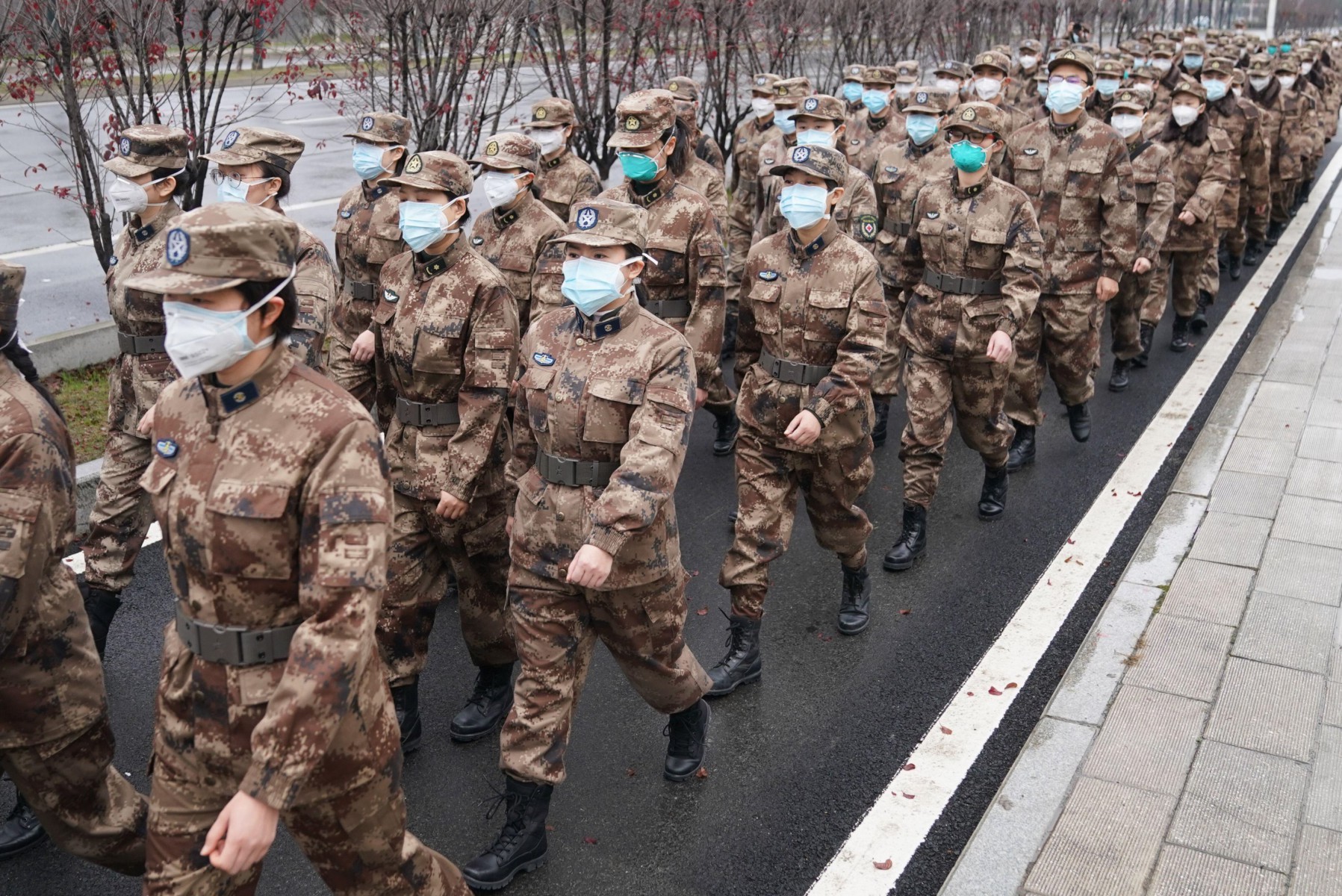 Wuhan, China's Hubei Province. 26th Jan, 2020. Members of a military medical team head for Wuhan Jinyintan Hospital in Wuhan, central China's Hubei Province, on Jan. 26, 2020. Three teams of military staff totaling 450, who flew to Wuhan on Friday ni