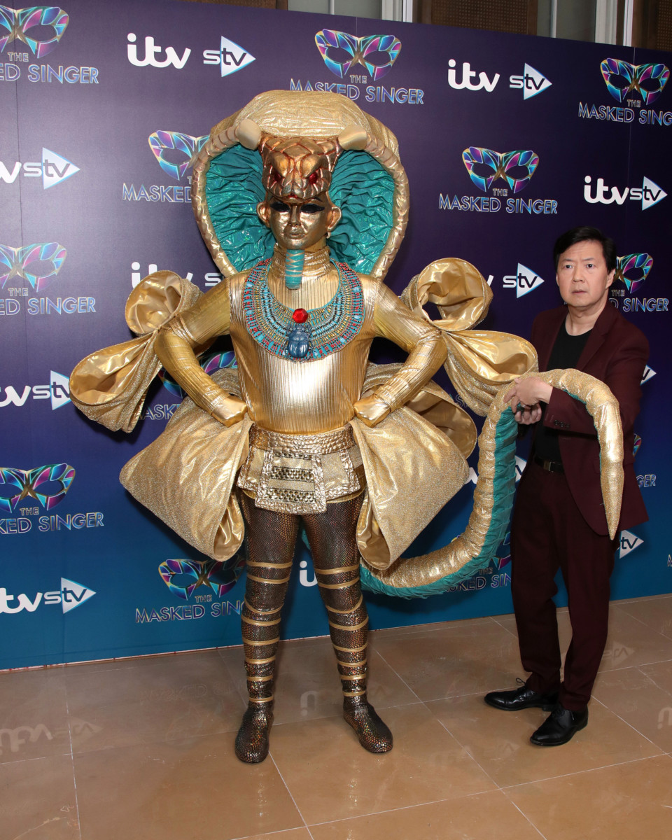 Ken Jeong poses with a masked celebrity, Pharaoh