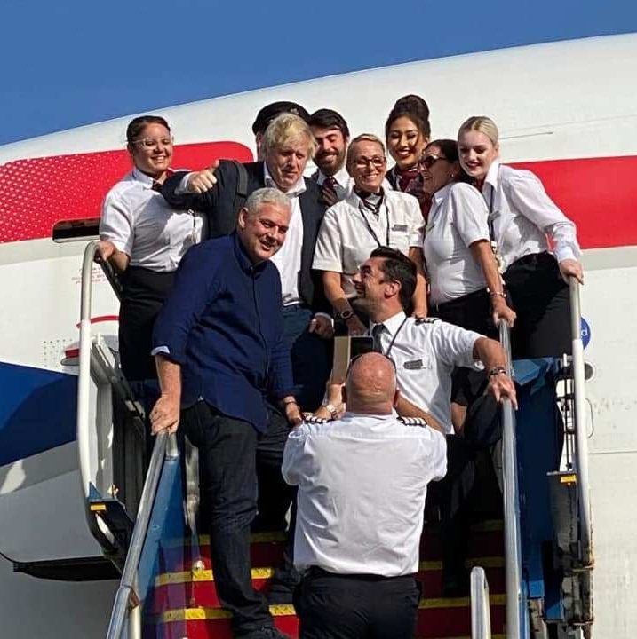 Boris poses with staff from British Airways during the brief layover in St Lucia