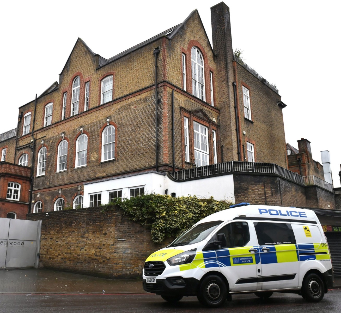 A police van was pictured outside Caroline's London home