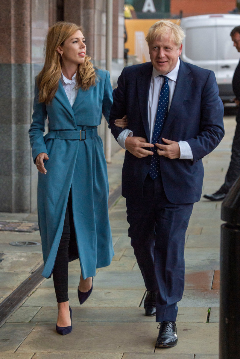 Boris and Carrie arriving at a Tory conference party together