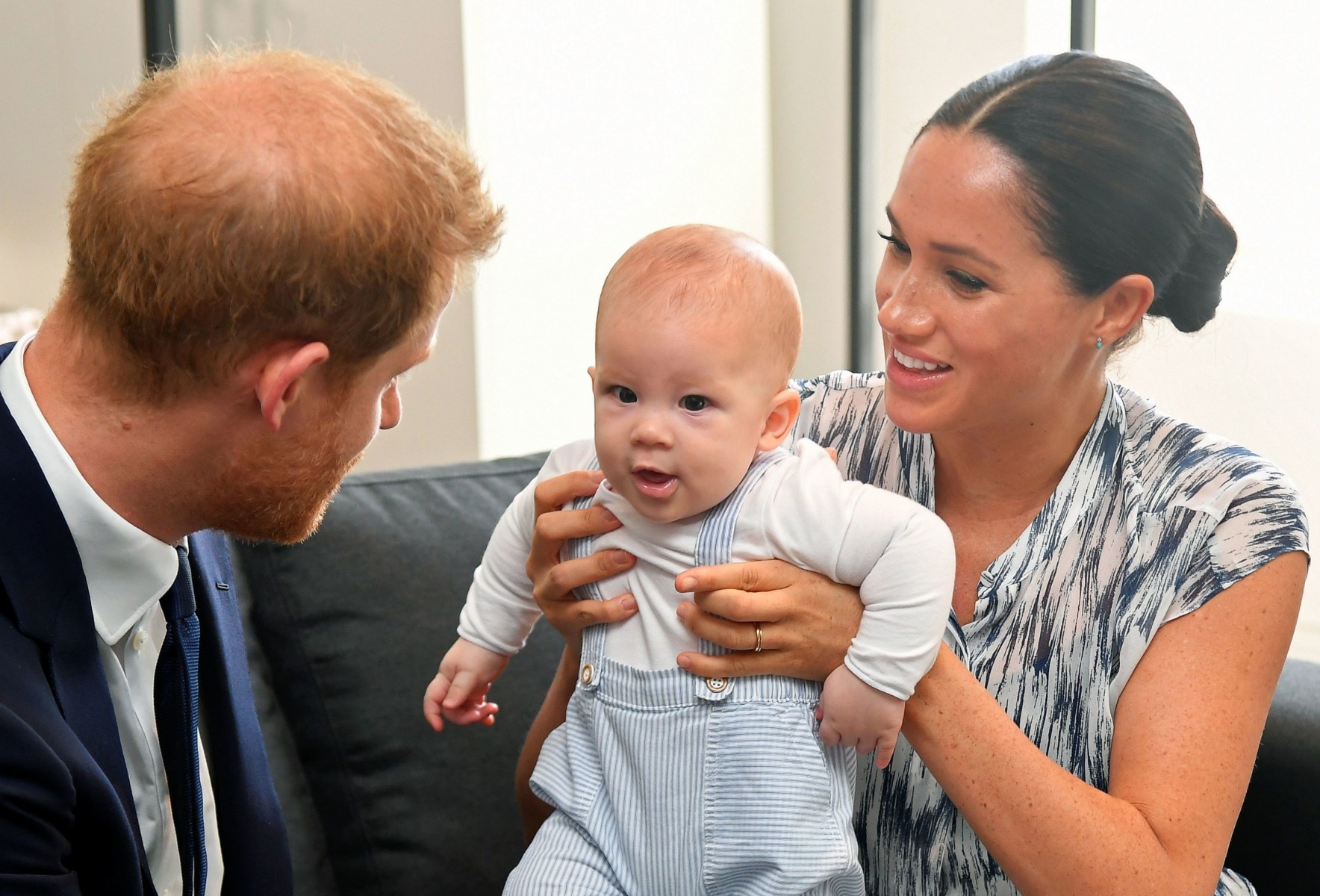 Harry with wife Meghan Markle and baby Archie