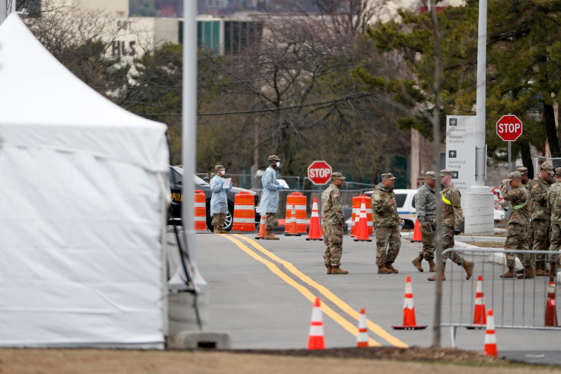 The National Guard helped direct cars at a drive-through testing station in Staten Island