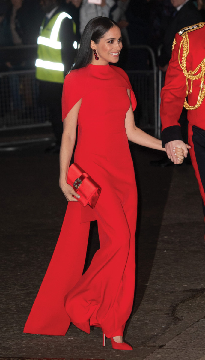 Meghan constantly turned heads for her bold and stylish looks, such as this luxury Safiyaa gown