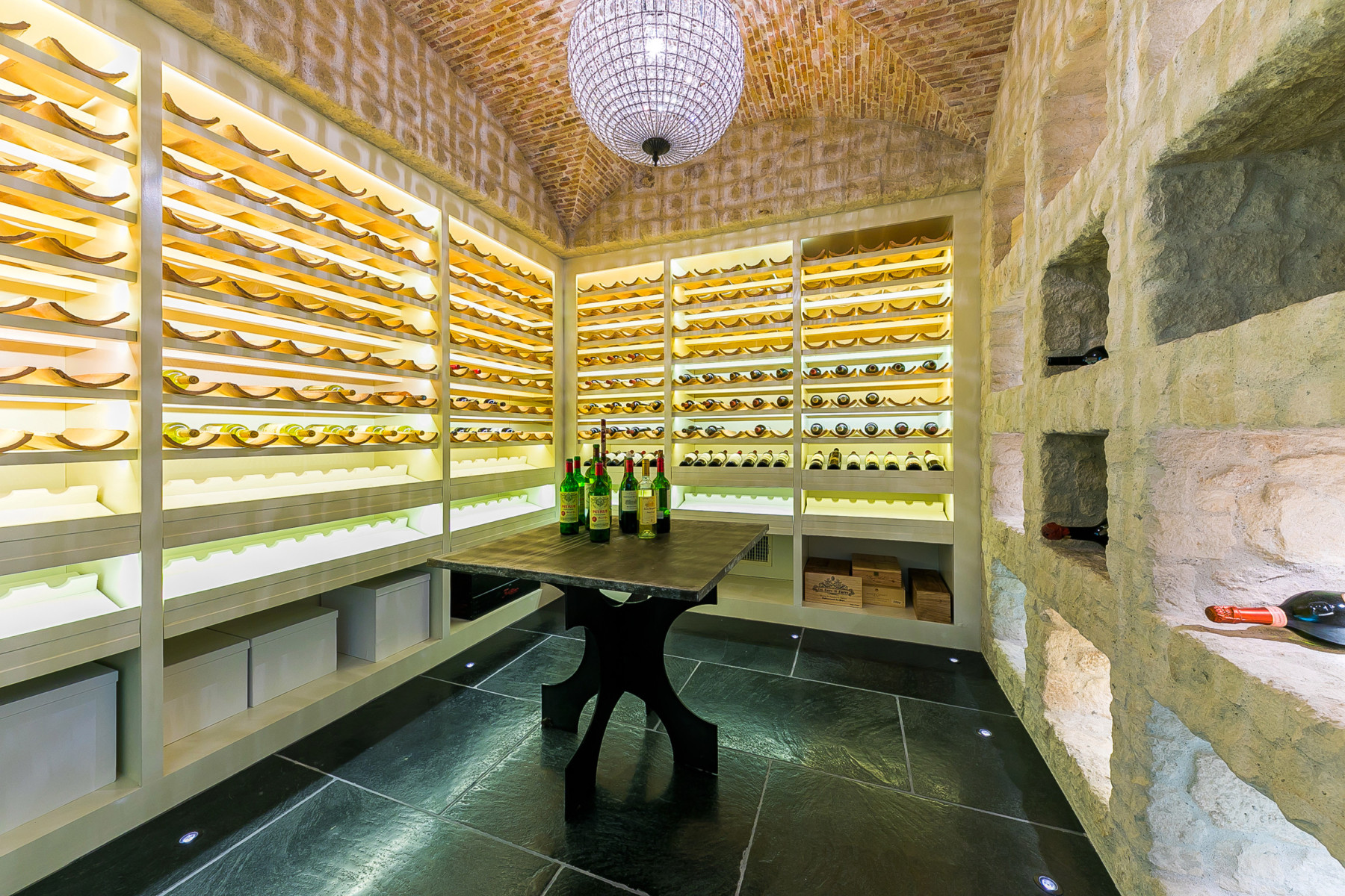 The Malibu home features a glamorous wine cellar that can house dozens of bottles