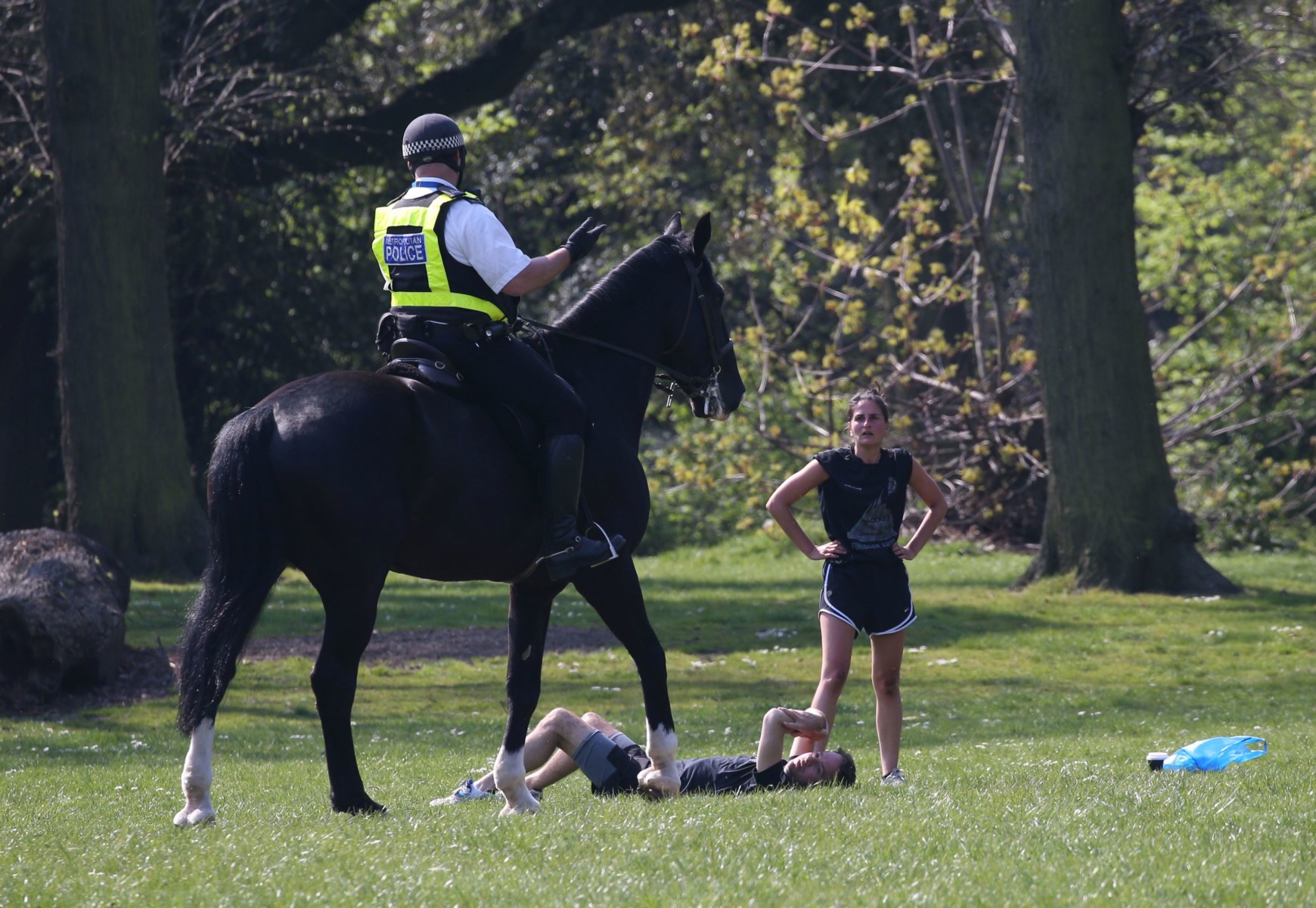 Police speak with people resting in parks over Easter weekend