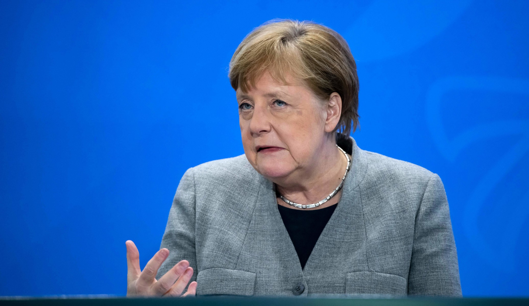 Angela Merkel said she will begin easing the coronavirus lockdown despite a spike in cases