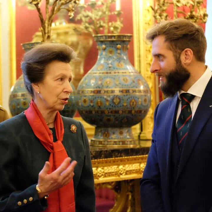 James, pictured meeting Princess Anne, shielded his pal during an attack in Afghanistan and carried him to safety