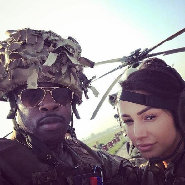 Rolan Bell, left, with Michelle Keegan, right, in Our Girl 