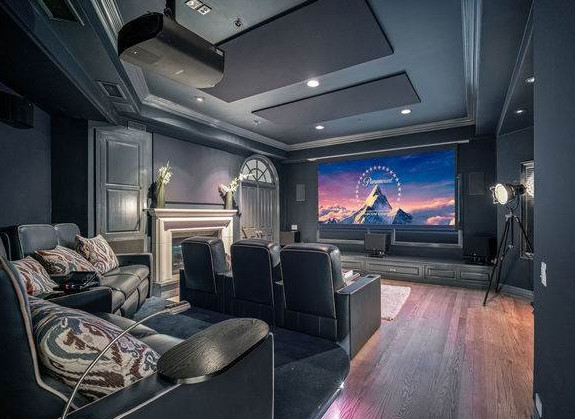 The couple can watch films in their own cinema room