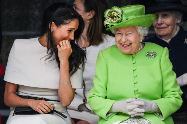 Enjoying a joke with the Duchess of Sussex on June 14, 2018, in Cheshire, aged 92