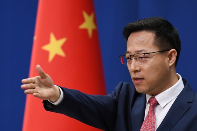 Foreign ministry spokesman Zhao Lijian said: 'We advise the UK to step back from the brink, abandon their Cold War mentality and colonial mindset'