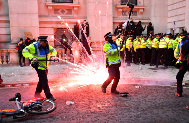 Demonstrators threw flares as police tried to dodge them