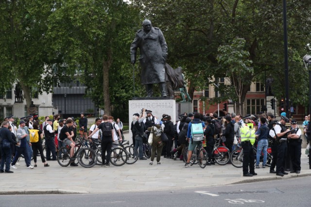  Protesters gathered round the statue of Churchill in London