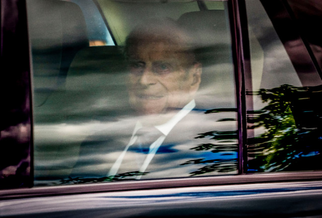 Prince Philip was later seen leaving the ceremony with the Queen