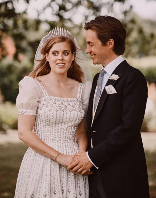 Edoardo looks lovingly at his bride following the secret Windsor ceremony