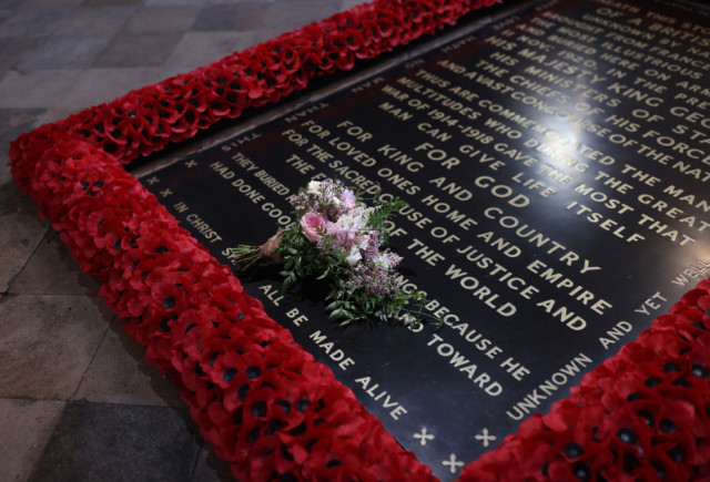 In royal tradition, the bouquet was placed on the Unknown Warrior
