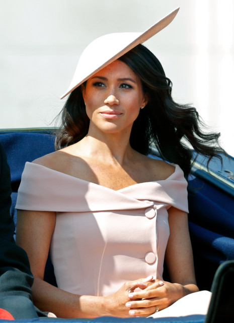  For her first Trooping the Colour in 2018, Meghan wore her beautiful locks down and wavy