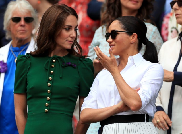  Meghan wore her hair in a ponytail at Wimbledon on Saturday as she watched the Women's Final with Kate Middleton