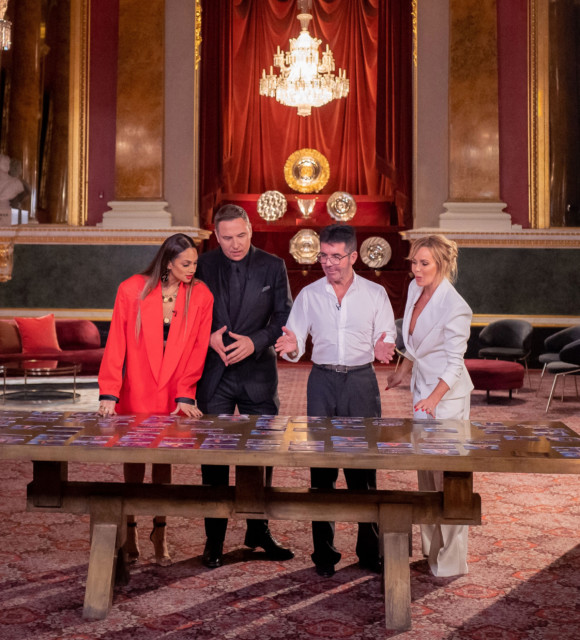 Simon Cowell with fellow judges Alesha, David and Amanda sifting through the acts