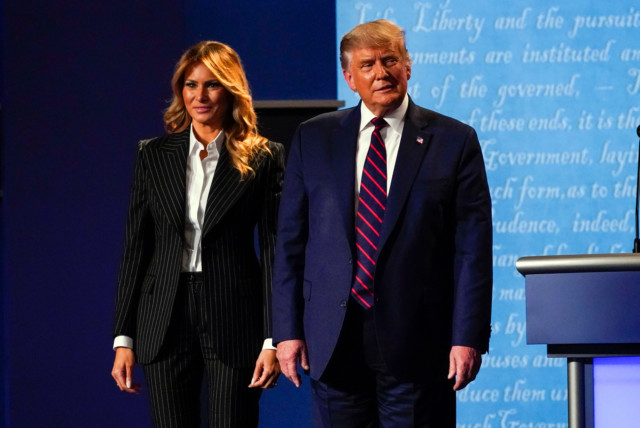 President Trump and First Lady Melania, pictured during Tuesday night's election debate, have tested positive for coronavirus