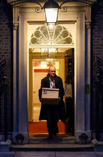 The aide was seen leaving Downing Street's front door with a box of stuff
