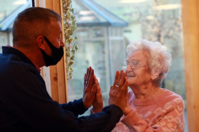 The new pilot to ring-fence rapid-test Covid tests could allow more touching scenes like this - the moment 92-year-old Freda Maddison was able to see her son Stephen for the first time in months