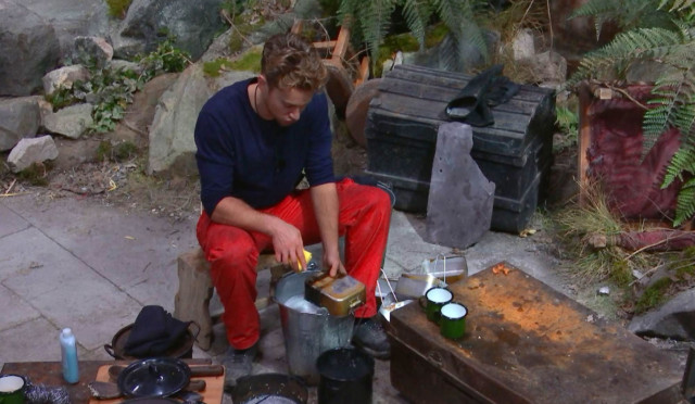 AJ very carefully washed all the mess tins and compared his efforts with Shane's