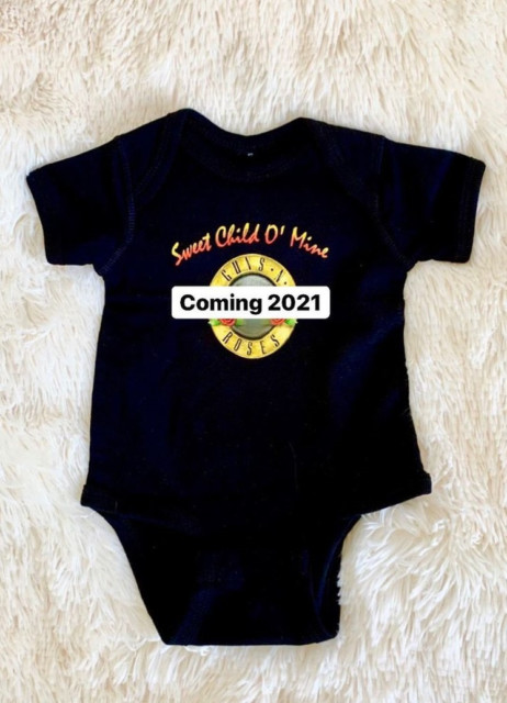 Laura Whitmore posted a shot of a babygro writing: 'Coming 2021'