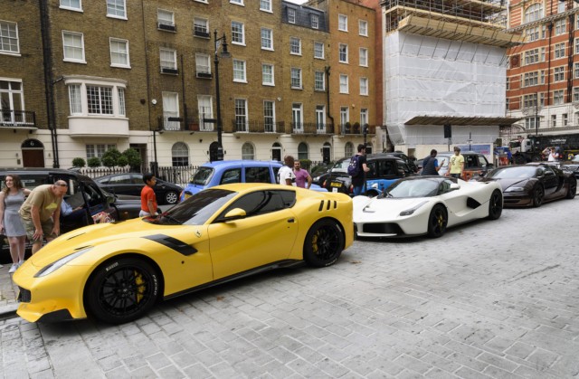  The sheikh's line-up includes (from front) a Ferrari F12TDF, a Ferrari LaFerrari, and a Bugatti Veyron Rembrandt