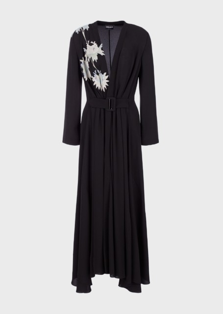 The £3,300 long triple silk dress features a lotus flower design, which Meghan chose for its “symbolic meaning of revival”, it has been claimed