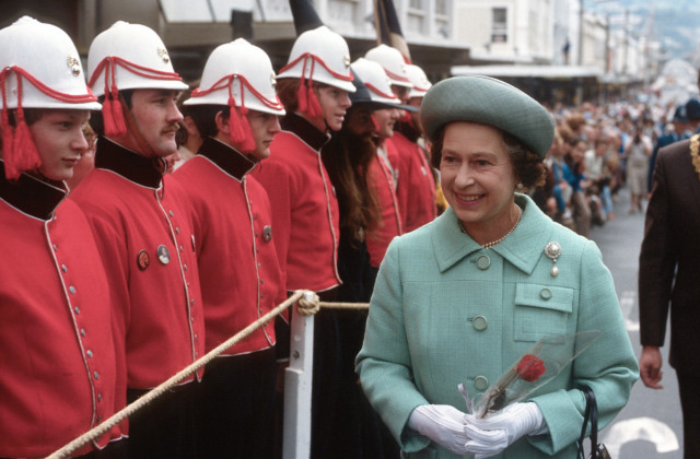 The Queen, 55, smiles during an inspection as she tours New Zealand on October 01, 1981