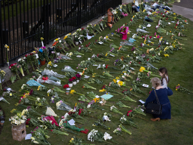 Dozens of flowers have been left in memory of the royal