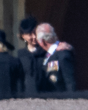 The Duchess put a loving hand around Charles' shoulder